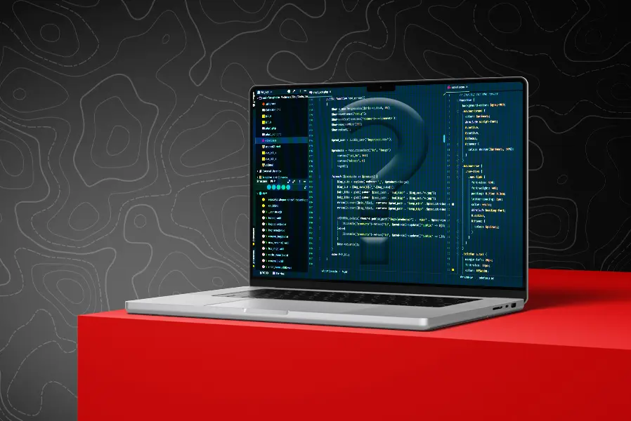 Laptop Mockup auf einem Roten Würfel mit schwarzem Hintergrund